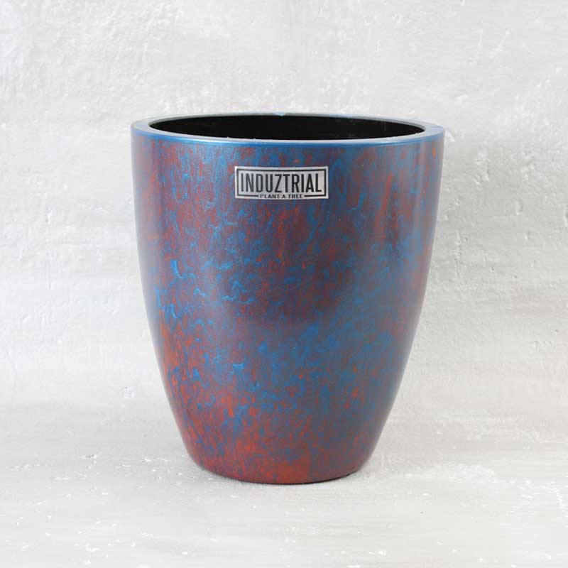 Sfeerfoto handgeschilderde vaas oranje en metallic blauw van Plant a Tree