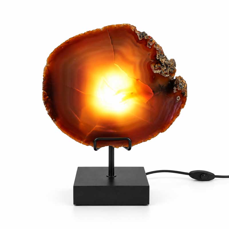 Agaat lamp Ember met warme verlichting, roodbruine agaatschijf en zwarte voet